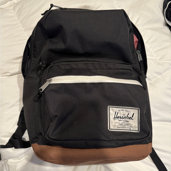 herschel backpack brown bottom Heritage Supply Co. USA The main compartment features a drawstring closure with an easy Herschel Supply Co. Little America